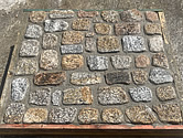 Display sample of granite cobbles