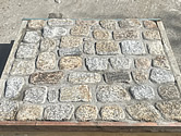 Cornish granite cobbles cemented in a frame