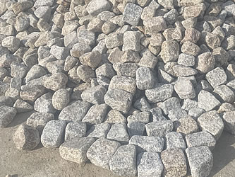 Pile of granite cobbles at our quarry